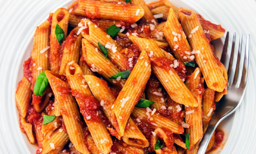 Bowl of Penne Pomodoro pasta with red sauce