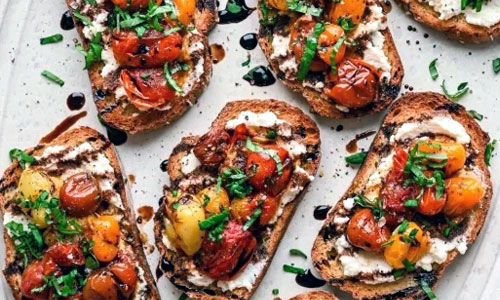 Crispy Bruschetta bread slices with tomatoes